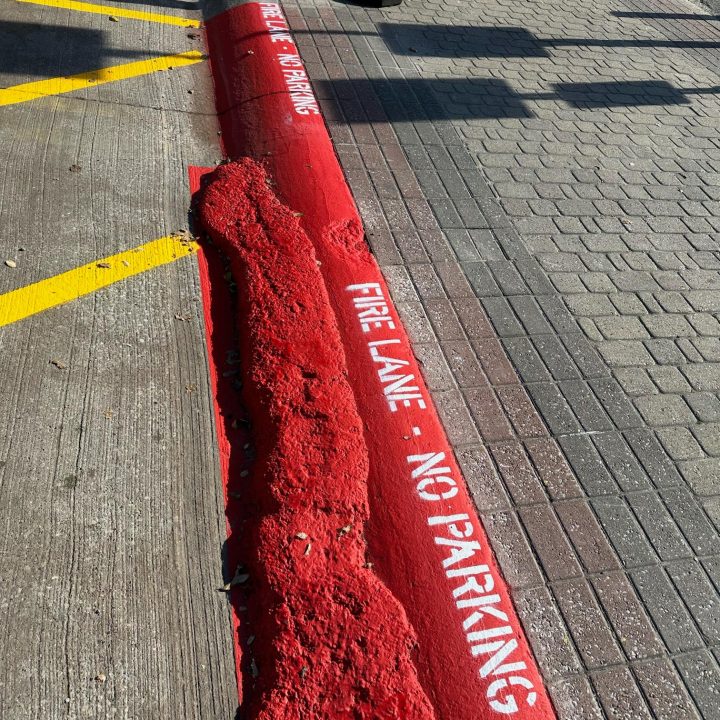 red painted fire lane striping in deep ellum texas